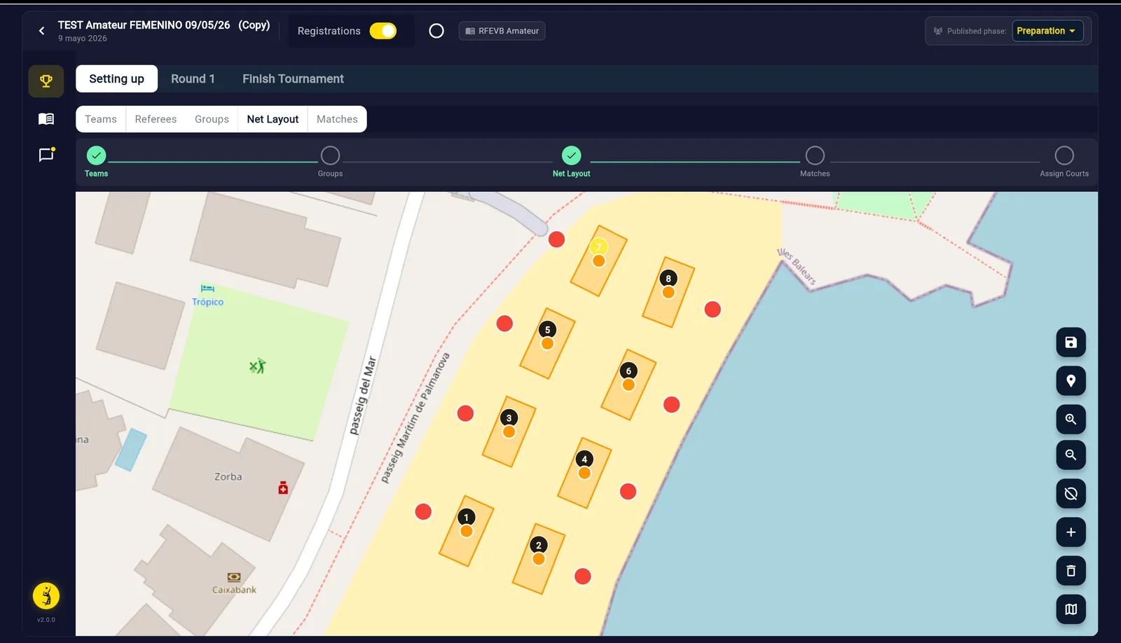 La tab Net Layout: campi numerati posizionati sulla mappa della spiaggia, con la barra di avanzamento della configurazione e gli strumenti della mappa